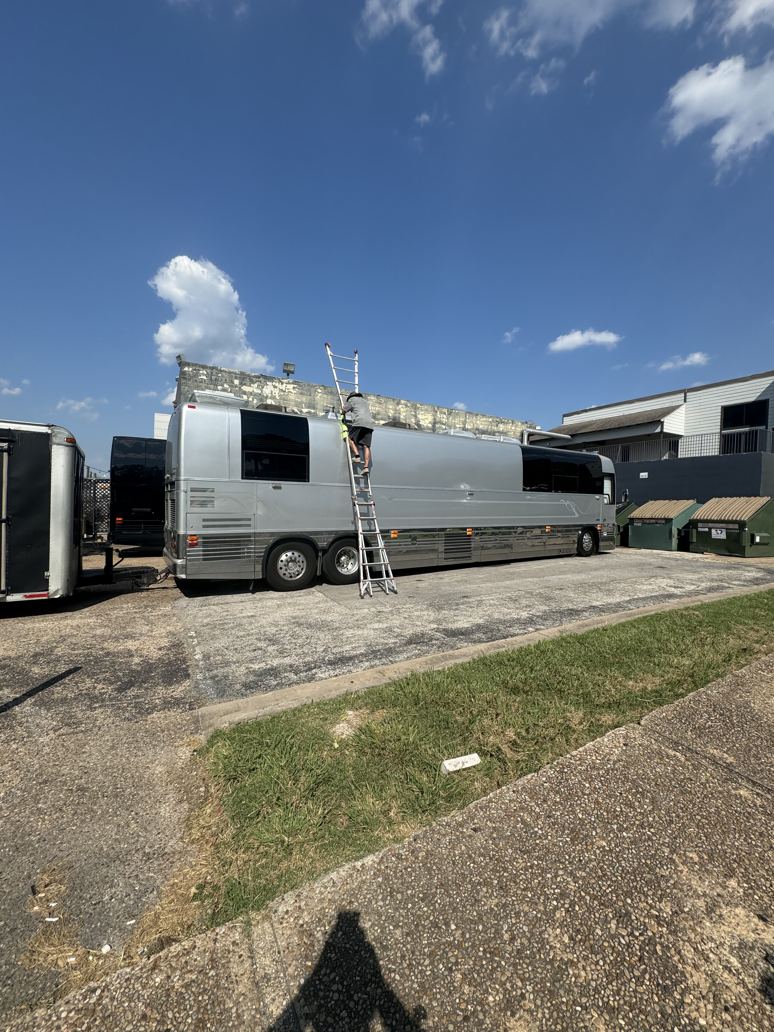 Wide-angle view of an entertainer coach roof during a pre-purchase RV systems check — Boss Bull Mobile RV Services Central Texas